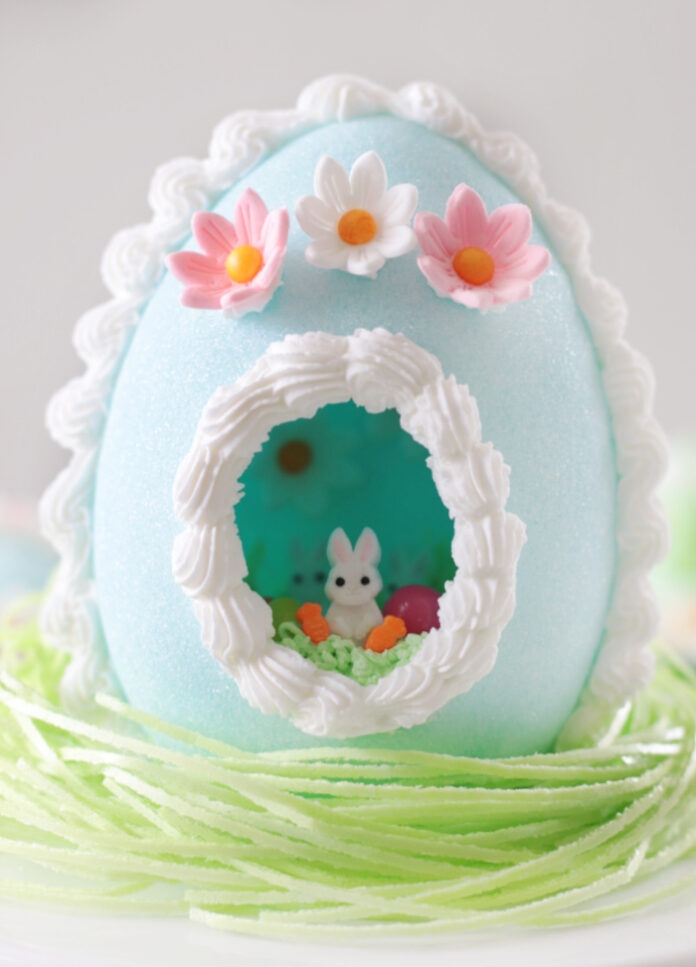 pale blue sugar egg on green edible easter grass